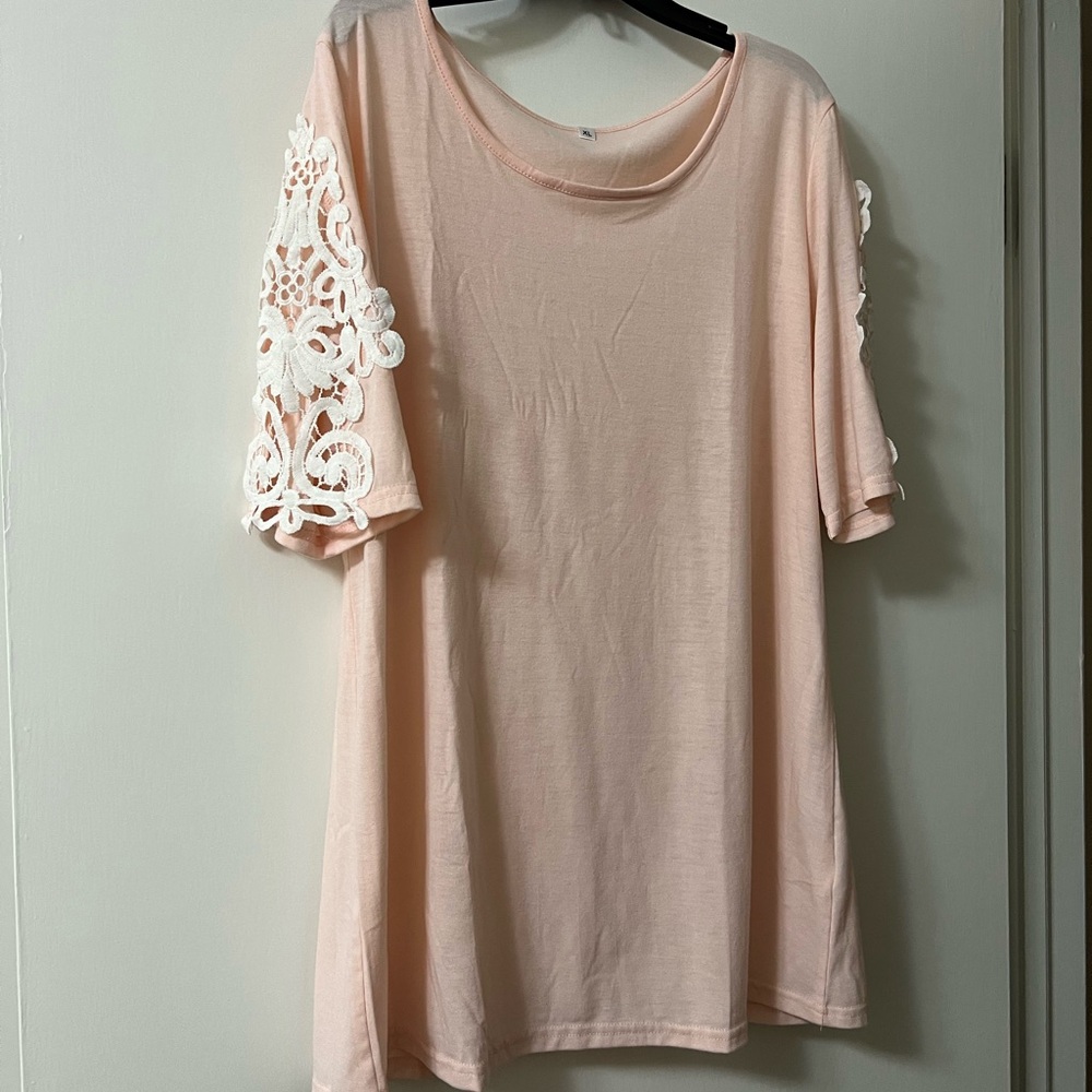 Peach shirt with detailed sleeves